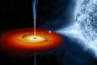 NASA заявило о возможном излучении черными дырами света