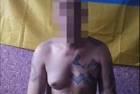 СБУ задержала террориста из группировки "Восток" с татуированной на груди свастикой (видео)