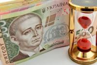 НБУ на 15 июля укрепил курс гривны по отношению к доллару до 24,80