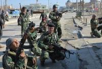 В результате взрывов смертников в Фаллудже погибли более 40 иракских военных