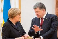 Порошенко и Меркель обсудили санкции против РФ и подготовку к саммиту НАТО