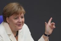 Меркель обещает не дать Британии "снять сливки" с Brexit