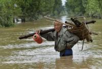В Китае из-за наводнений на четырех водохранилищах произошли прорывы воды, разрушены тысячи домов