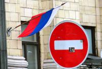 Туск: санкции против России сохранятся до выполнения Минских соглашений