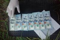 В Ивано-Франковской области майор полиции требовал тысячу долларов за закрытие уголовного производства