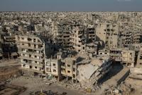 В разрушенный бомбардировками сирийский Хомс возвращаются люди