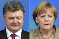 Порошенко обсудил с Меркель ситуацию на Донбассе и безвизовый режим