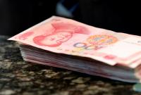 Китайский юань с 1 октября официально войдет в валютную корзину МВФ, потеснив евро