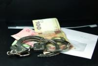 Доцента одного из столичных вузов взяли под домашний арест за взяточничество