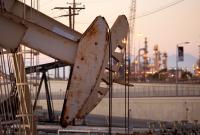 Нефть Brent торгуется ниже 55 долл. за баррель