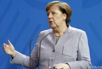СМИ: Меркель тайно передала британским спецслужбам досье на Путина