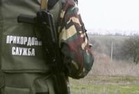Пограничники обнаружили в Донецкой области тайник с оружием и российской форме