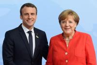 Меркель и Макрона призвали возглавить борьбу с изменениями климата