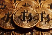 Курс Bitcoin впервые поднялся выше 5 тыс. долл