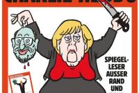 Charlie Hebdo поместил на обложку Меркель с головой Шульца в руке