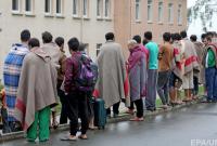 Германия ускорит обработку заявлений беженцев о приюте