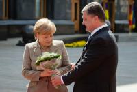 Порошенко встретится с Меркель и поговорит о Донбассе