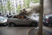 В ряде городов Швеции неизвестные в масках подожгли десятки автомобилей