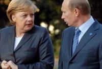 Меркель призвали потребовать от Путина освобождения Сенцова
