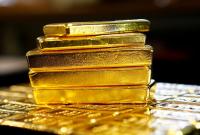 Bloomberg: РФ бросилась скупать золото с перепугу перед новыми санкциями США