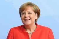 Меркель договорилась с 14 странами об ускорении процедуры возвращения мигрантов