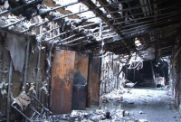 Потерявший в пожаре в Кемерово всю семью мужчина рассказал о зрителе, закрывшем двери в кинозал