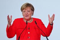 Меркель исключила свою скорую отставку: Я здесь, я жива и здорова