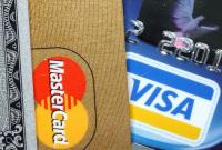 Российские банки готовятся к отключению от Visa и Mastercard