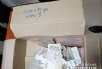 Подкуп избирателей в Черкассах: правоохранители обнаружили коробки с деньгами и списки граждан