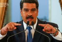 Его цель - выиграть время: Болтон заявил, что вести переговоры с Мадуро бессмысленно