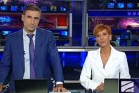 Ведущие главной информационной программы телеканала "Рустави 2" совершили демарш в прямом эфире