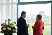 Порошенко и Меркель поддержали пасхальное прекращения огня на Донбассе