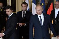 На переговоры лидеров "нормандской четверки" Путин пришел с вооруженным охранником