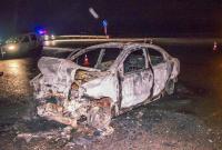 Машина сгорела дотла: под Киевом столкнулись два авто, пострадали три человека
