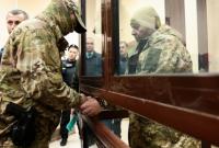 Правительство организует поездку семей военнопленных моряков на суд в РФ