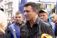 Нардеп Тищенко потребовал от полиции "разобраться" с двумя женщинами, которые держали его за руку (видео)
