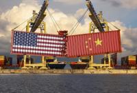 Мировая экономика потеряет от торговой войны США и Китая сотни миллиардов, – Reuters