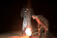 "Самая ненавистная вещь на Земле": Сенцов сжег свою тюремную робу (видео)