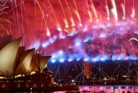 Полтора миллиона человек собрались в Сиднее, чтобы встретить Новый год рекордным салютом и фейерверками