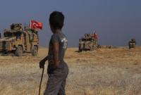 Турция заявила, что "без колебаний ответит на любую угрозу" и ввела бронетехнику в Сирию