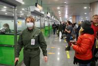 "У масках і захисних костюмах": у "Борисполі" розповіли, як зустрічають рейси з Китаю