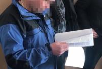 В Киеве полицейского подозревают в вымогательстве 28 тыс. долларов взятки