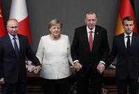 Меркель і Макрон закликали Путіна і Ердогана розрядити кризу в Сирії