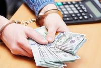 На Прикарпатье главу ОТО разоблачили во взятке в 3,4 тыс. долларов
