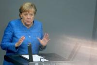 Германия "будет прямо говорить" о России во время президентства в ЕС - Меркель