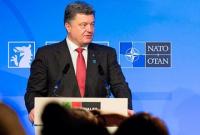 В НАТО ожидают услышать от П.Порошенко в Варшаве отчет о выполнении минских соглашений