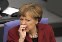 "Германия не будет влезать в долги из-за беженцев",- Меркель