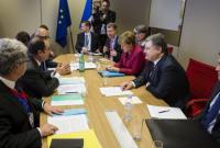ЕС сохранит санкции против РФ до полного выполнения ею Минских договоренностей, - Меркель и Олланд