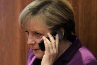 Меркель призвала Путина повлиять на боевиков на Донбассе
