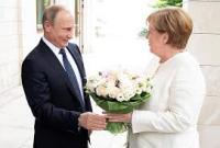 Меркель во время разговора с Порошенко рассказала об итогах встречи с Путиным